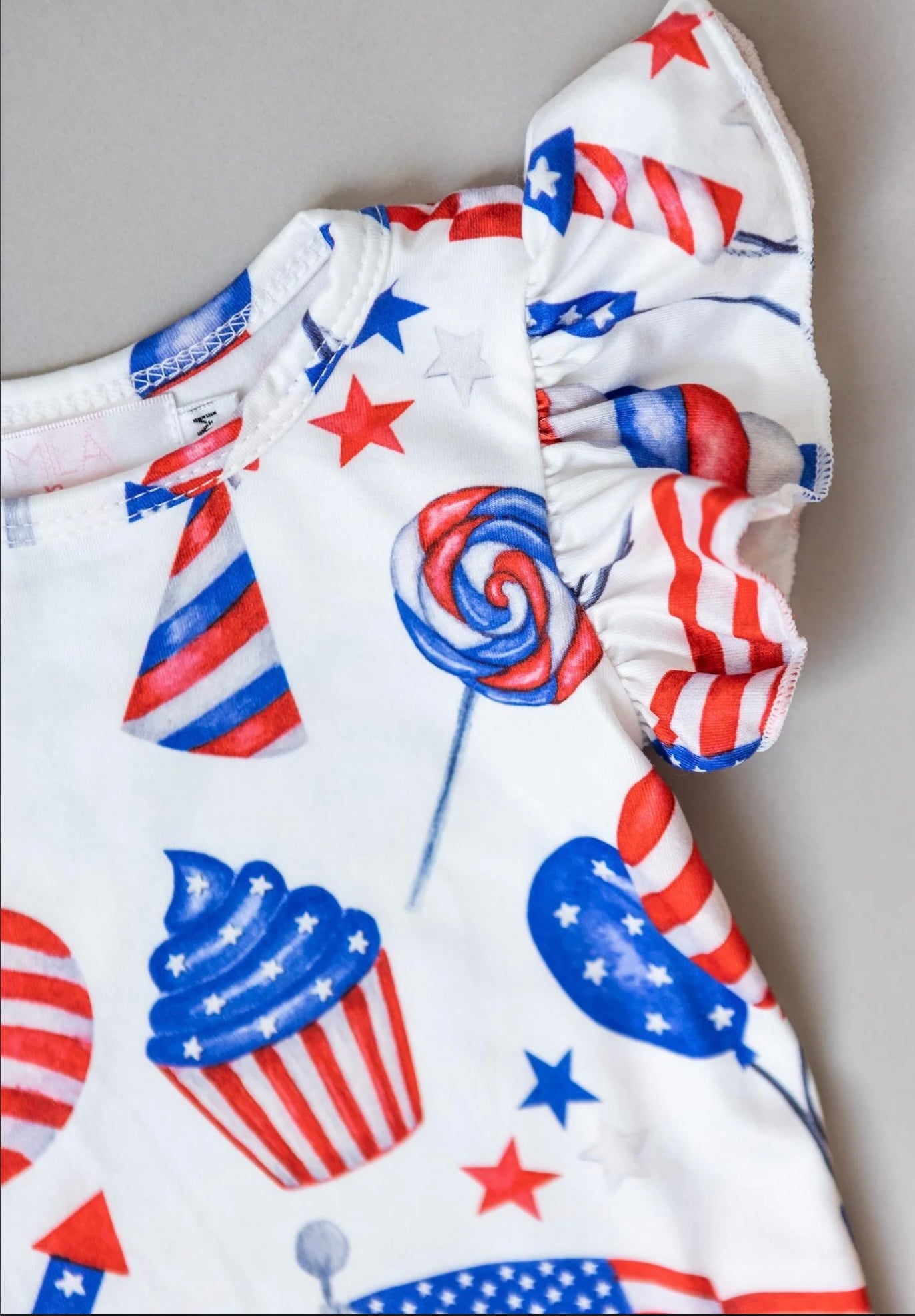 PARTY IN THE USA S/S FLUTTER BODYSUIT