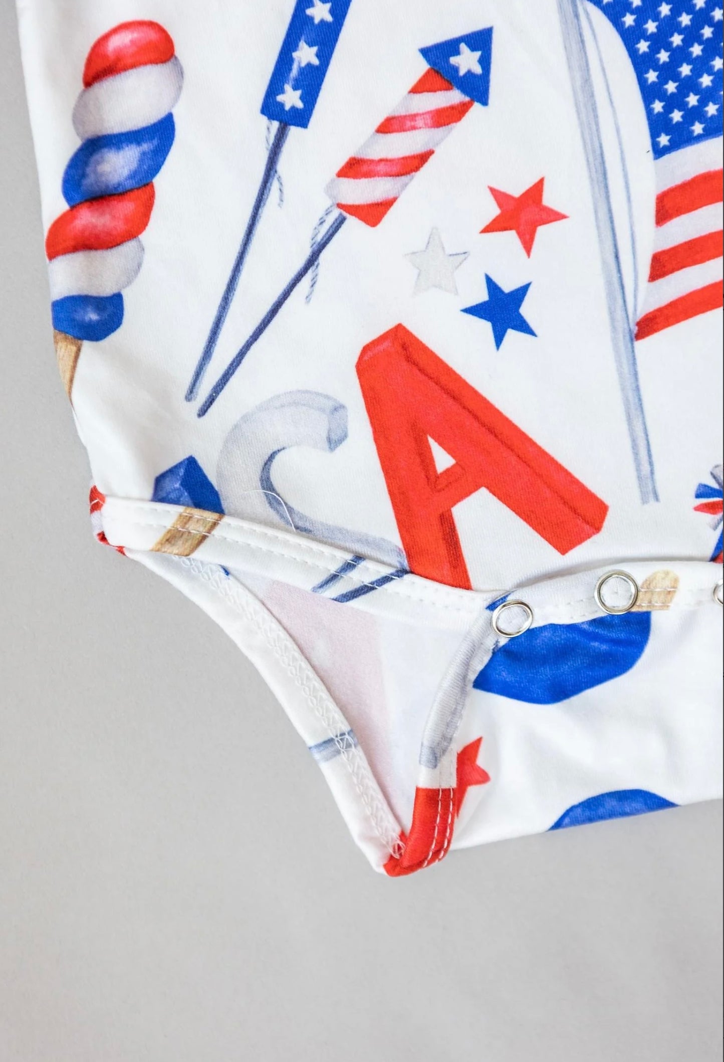 PARTY IN THE USA S/S FLUTTER BODYSUIT